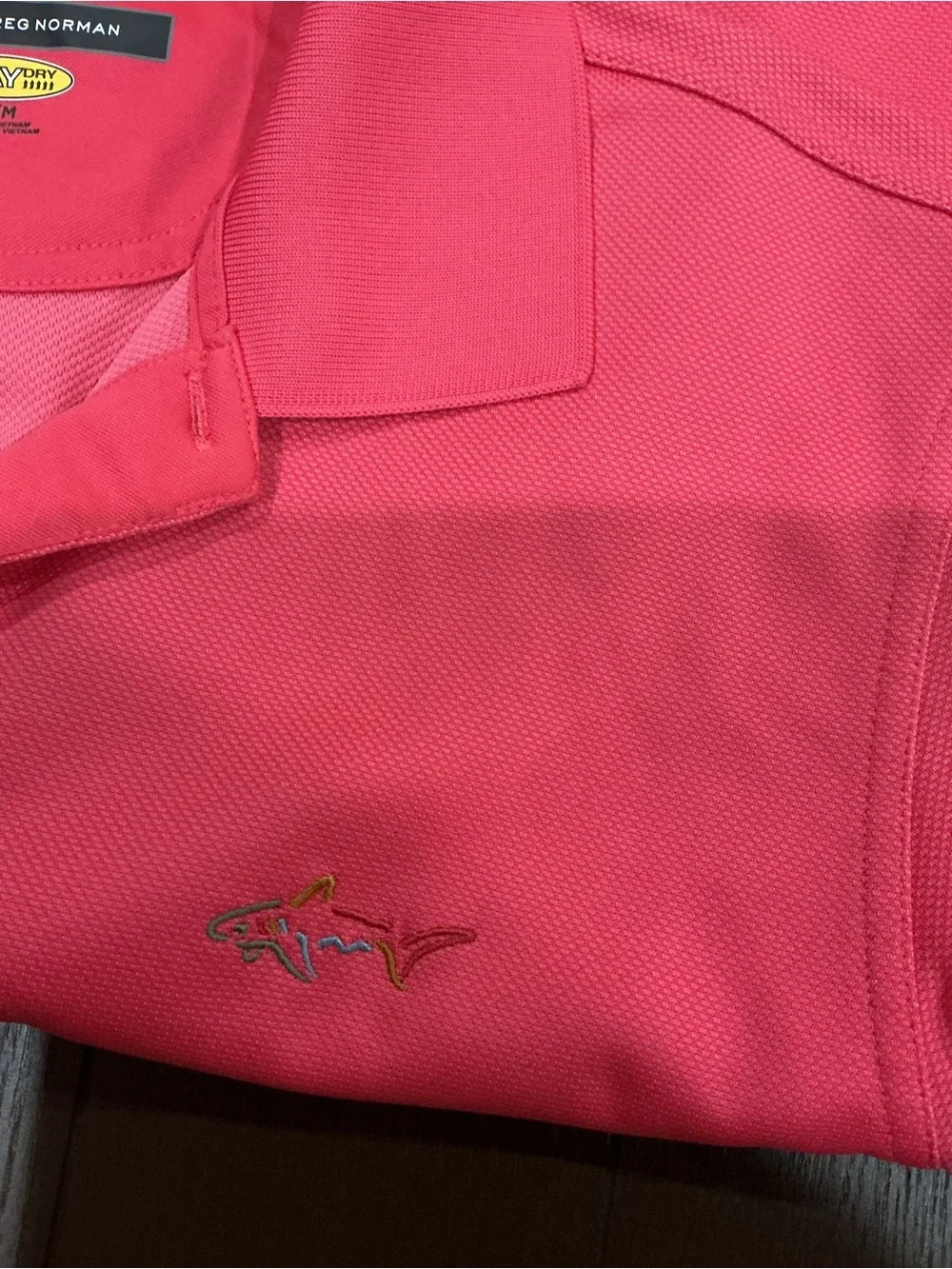 Greg Norman Collection Men's Polo Shirt in Bright Pink